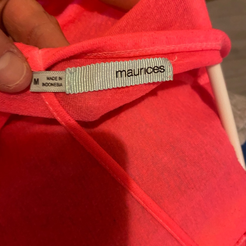 Woman’s pink top